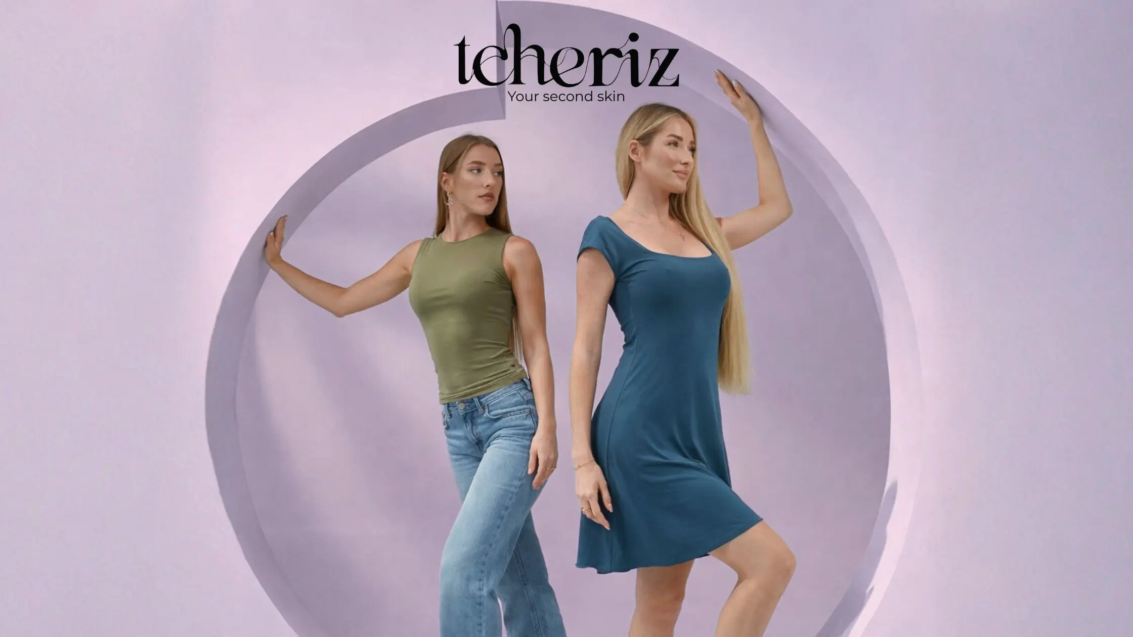 Two women modeling clothing with 'tcheriz' brand logo on a light purple background